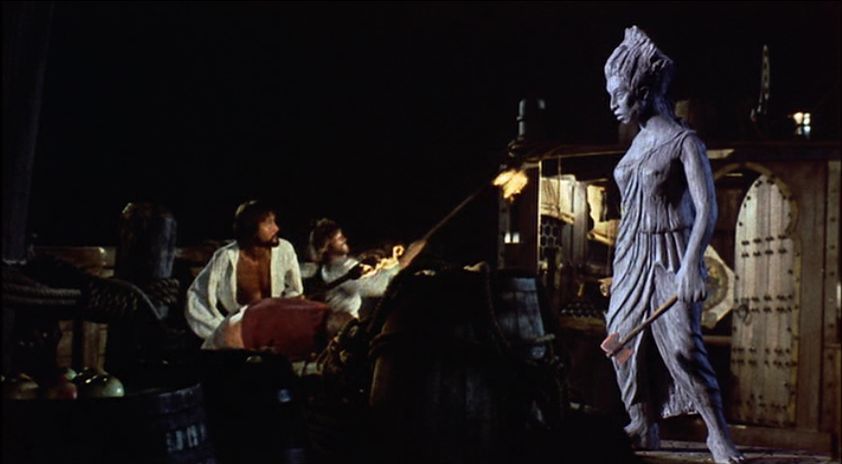 The animated ships figurehead from The Golden Voyage of Sinbad menaces Sinbad and his crew.