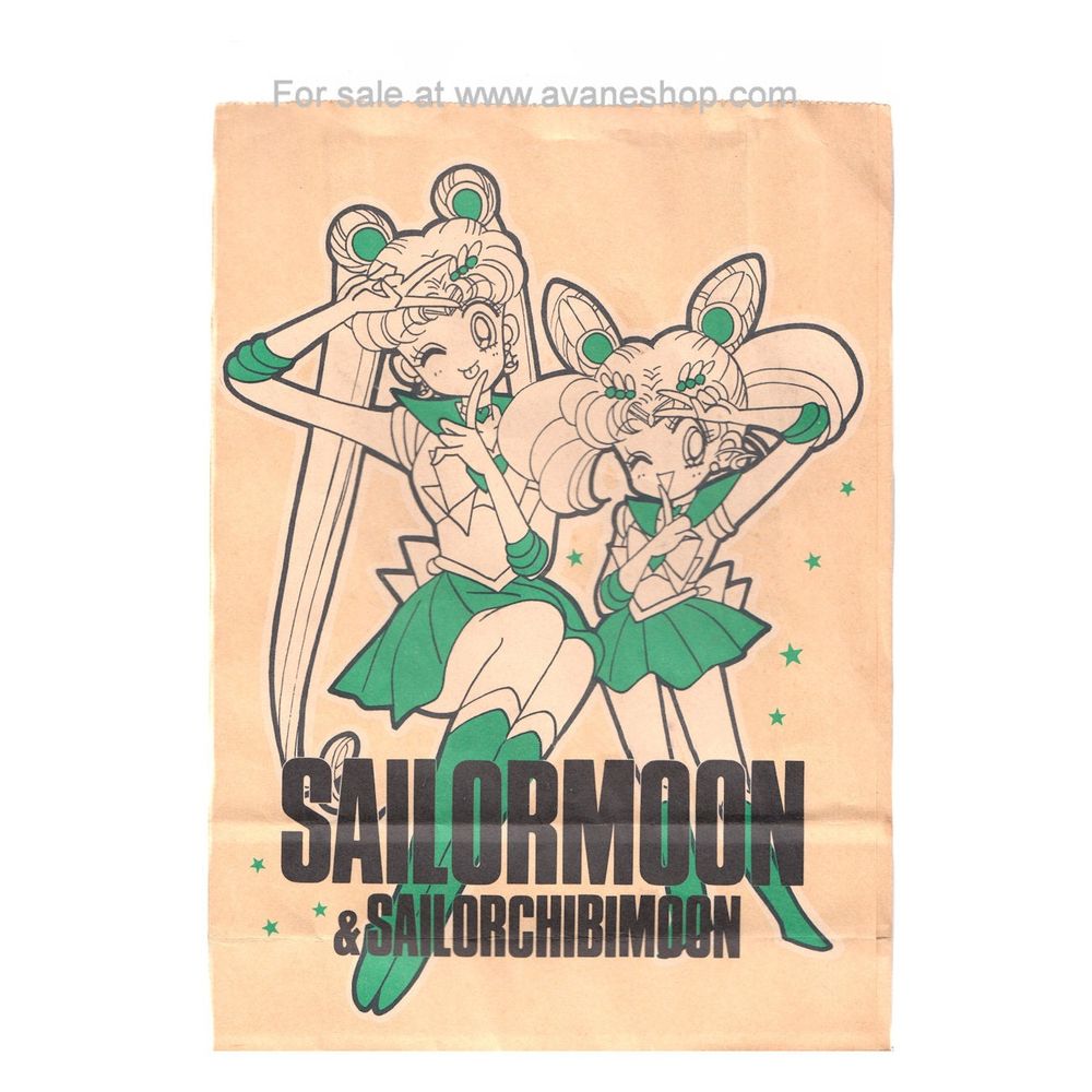 A brown paper bag featuring and image of Usagi and Chibiusa as Sailor moon and Sailor Chibimoon. The girls are depicted full body with a fully Green & White color scheme. Both are winking and Sailor Moon is sticking her tongue out.