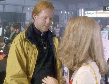 David Morse in 12 Monkeys wearing a very obviously fake red ponytail wig 