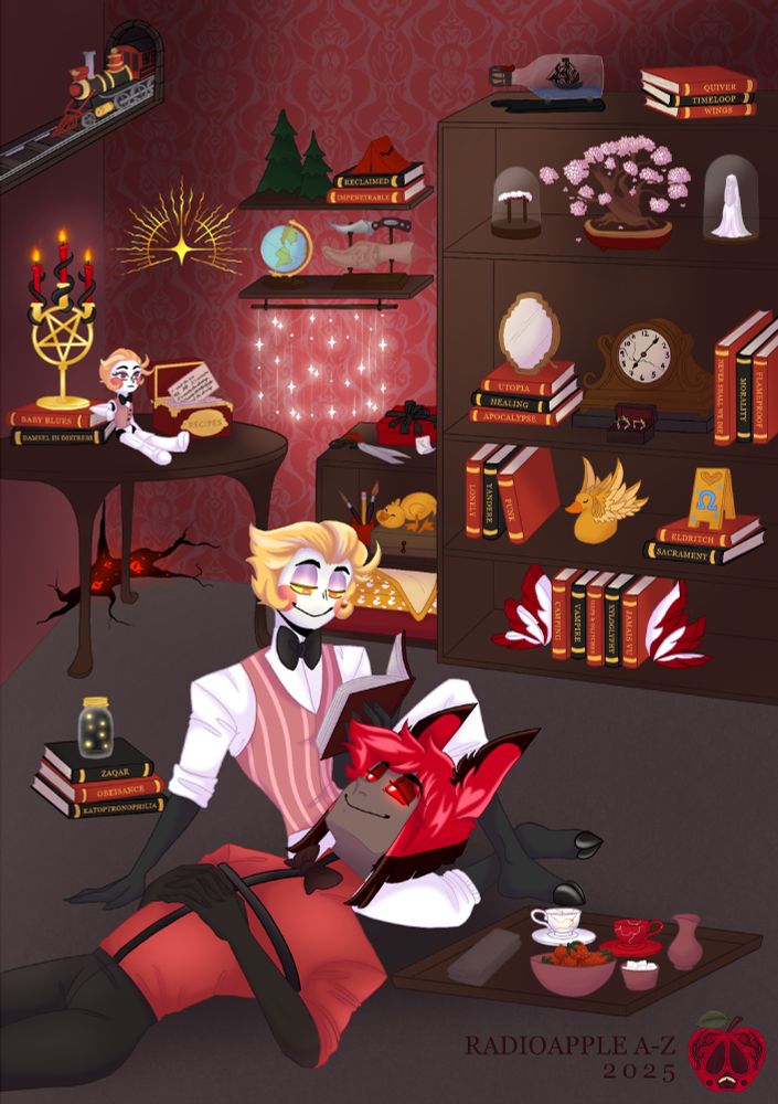 The photo features the cover reveal for the RadioApple A to Z Project 2025's event, featuring Alastor laying down with his head in Lucifer's lap as he reads a book. They're surrounded by little knick-knacks and books representing each of the 26 fics and art.
