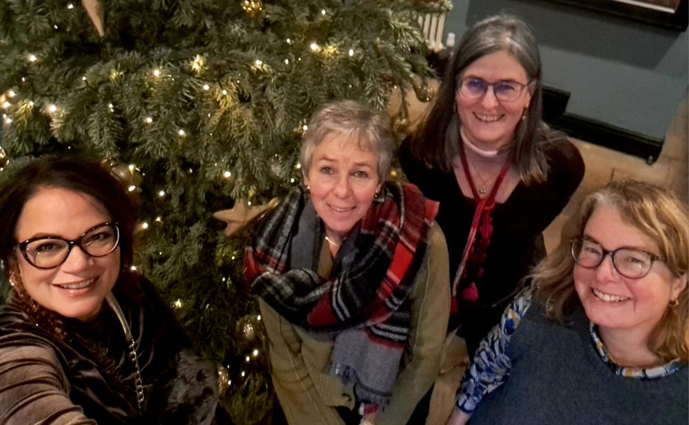 CEOs from BTO, RSPB, JNCC and WWT standing by a Christmas tree. 