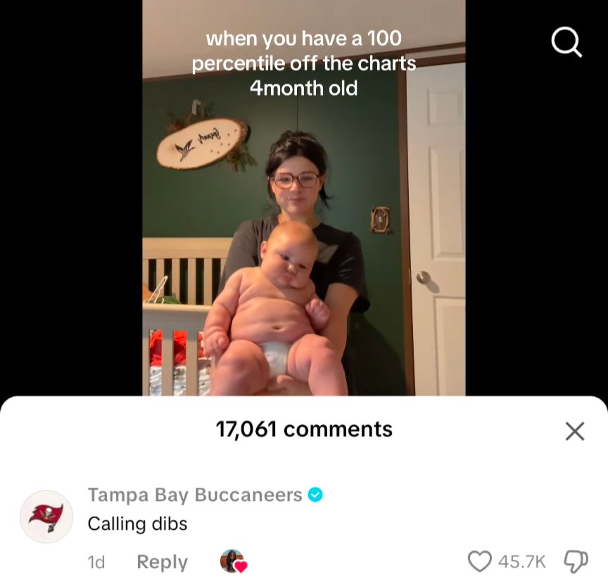 A tiktok of a mom showing off her 100 percentile baby which just means he is huge and the Tampa Bay Buccaneers have called dibs on said child 