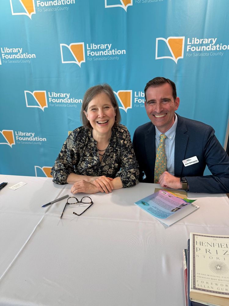 THE Ann Patchett and me (Mark Steinwachs) at a table, smiling. :)