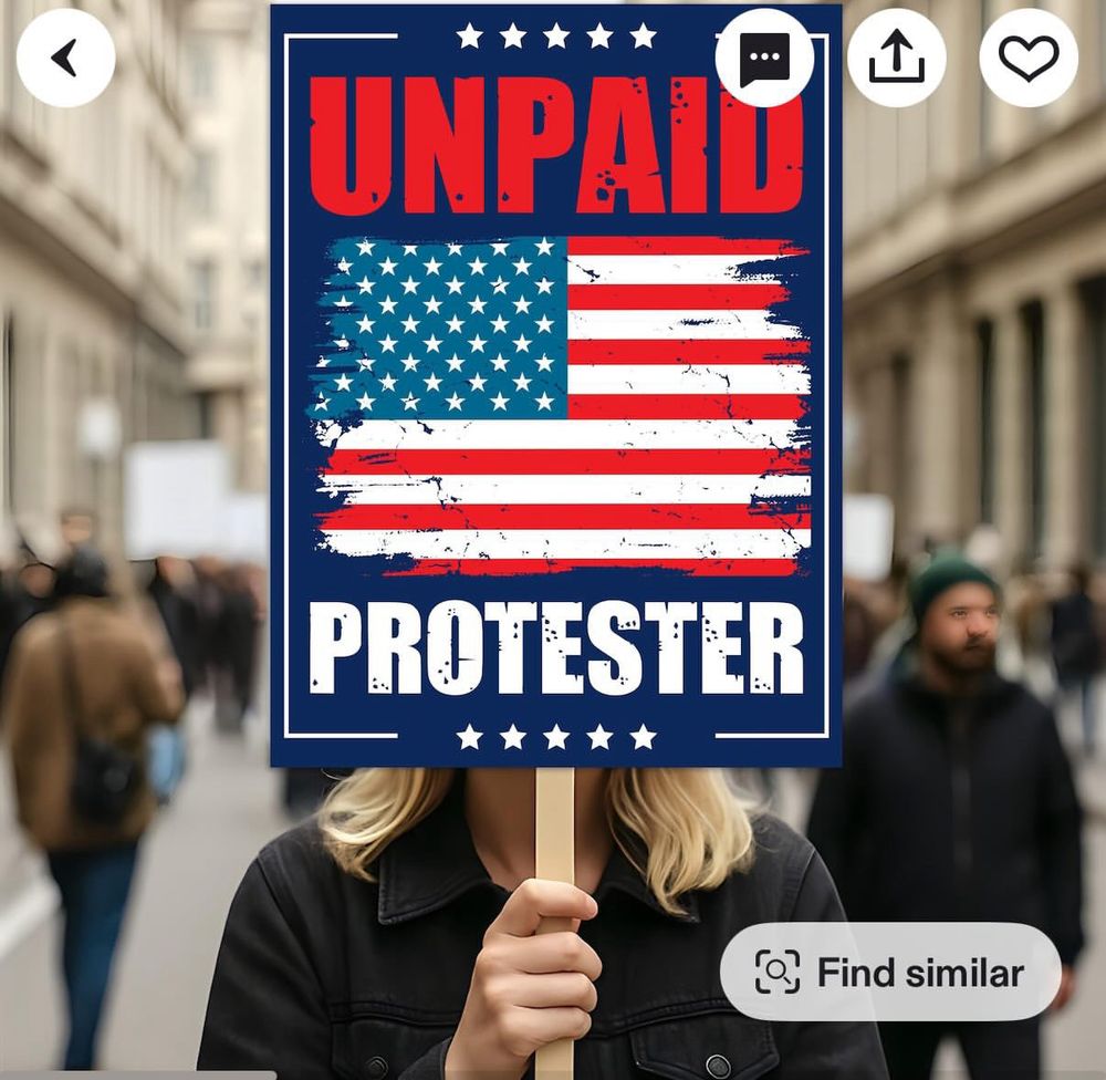 Woman holding a sign that says UNPAID PROTESTER #ANTIFA