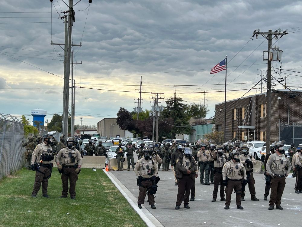 Two lines of many many cops outside ice Broadview . The first line is Illinois state police, the second line I believe is border patrol. I am not sure about the latter, but it seems likely
