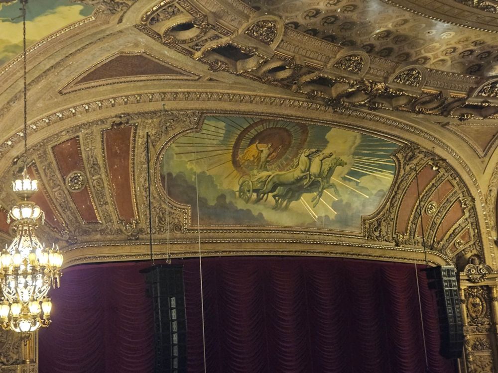 The proscenium arch at the Chicago Theatre. An image of Apollo in his chariot.