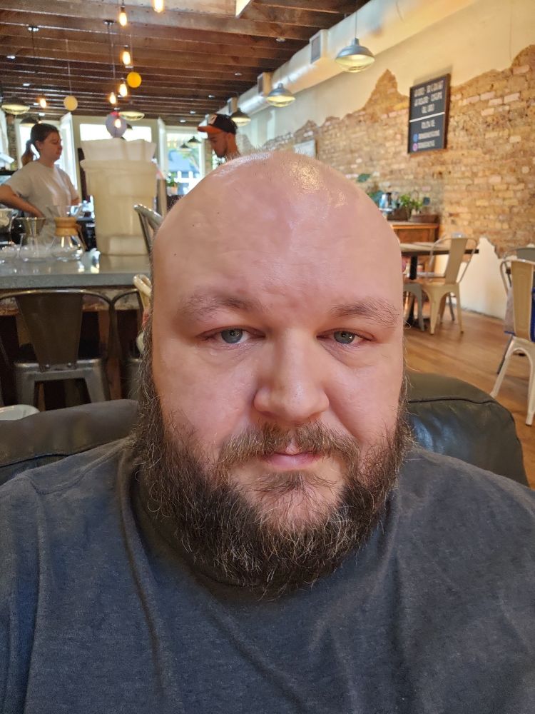 A man in a coffee shop