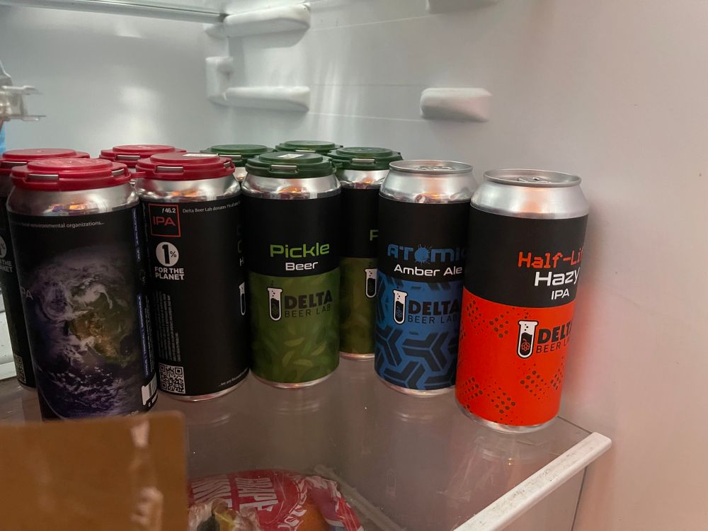 Beer cans in a garage fridge 