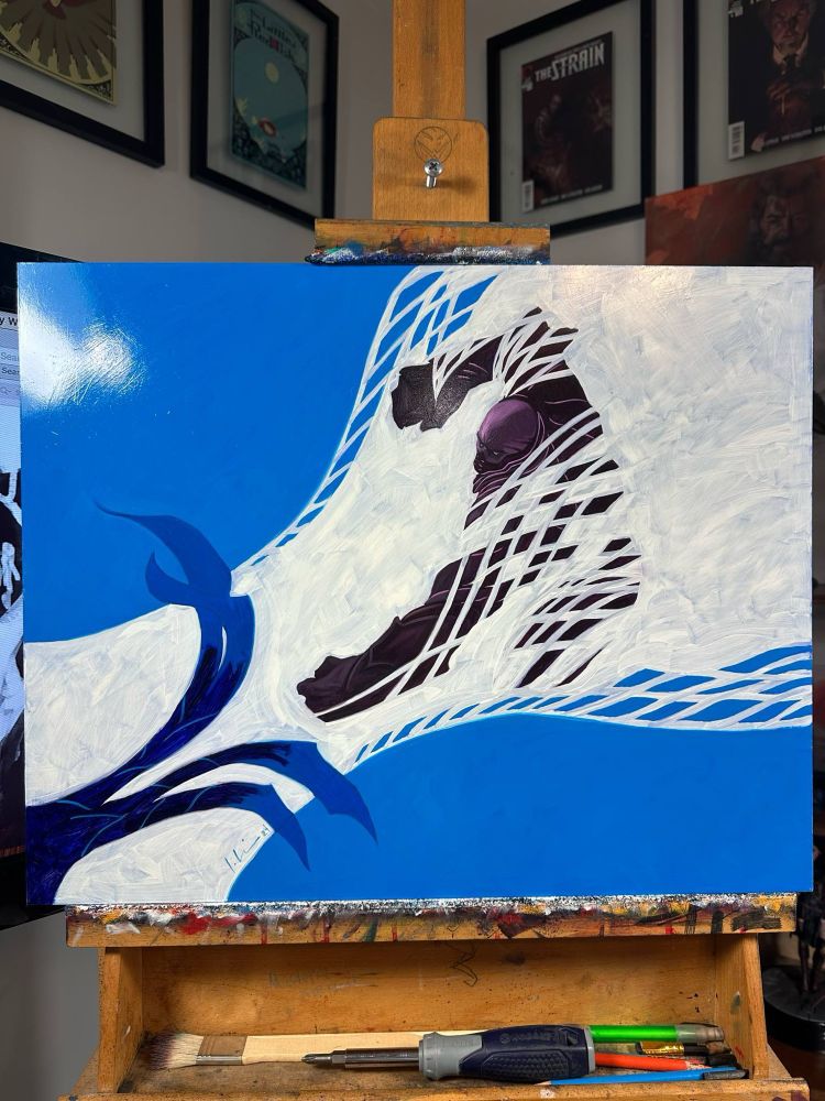 A painting on an easel of a fantastical humanoid creature looking like it’s being unmade by white magic, being sent by some sort of flipper or jellyfish tendril 