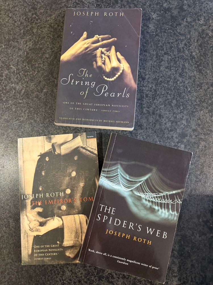 Paperback covers of "The String of Pearls", "The Emperor's Tomb" and "The Spider's Web" by Joseph Roth 
