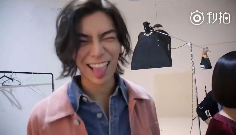 Ding yuxi sticking his tongue out