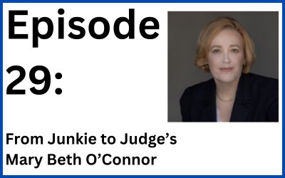 a white woman with short light red hair, wearing a dark suit over a white shirt. 'Episode 29: From Junkie to Judge's Mary Beth O'Connor'