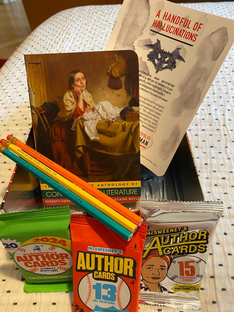 Inside the lunch box are three pencils, the “McSweeney’s Anthology of Contemporary Literature,” and three packs of author trading cards in packages modeled on 1970s-era Topps et al baseball cards.