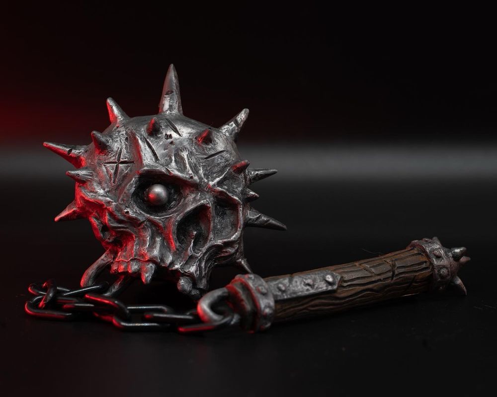 Resin skull on chain weapon