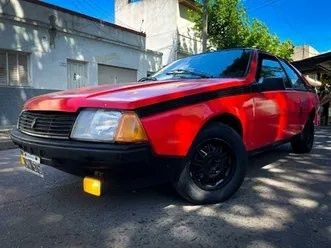 Let me tell you, folks, it's a beautiful red car. Absolutely stunning. One of the best, really. Everybody’s talking about it—people love it. It’s got that bright, amazing red color that just pops, folks. People say Renault Fuego is the most incredible car they’ve ever seen, and I agree. I know more about cars than anyone. It’s sleek, it’s fast, and believe me, it turns heads wherever it goes. Incredible car, everybody's talking about it, truly.