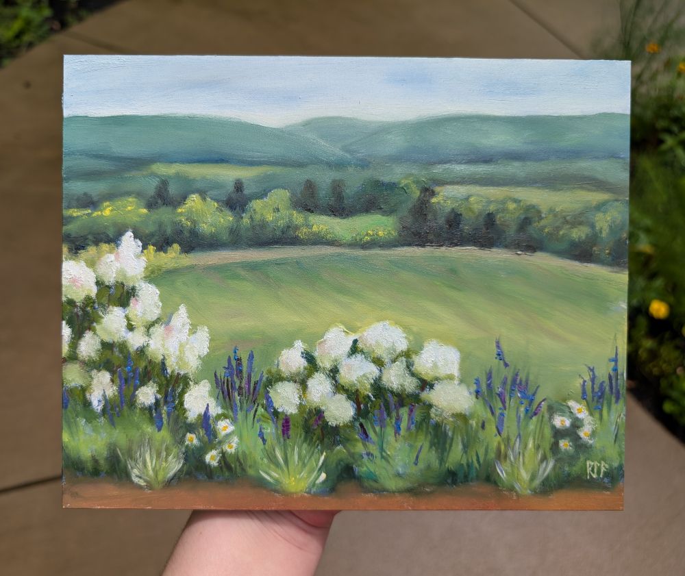 Landscape painting with hydrangeas in the foreground and a ridge in the distant background.