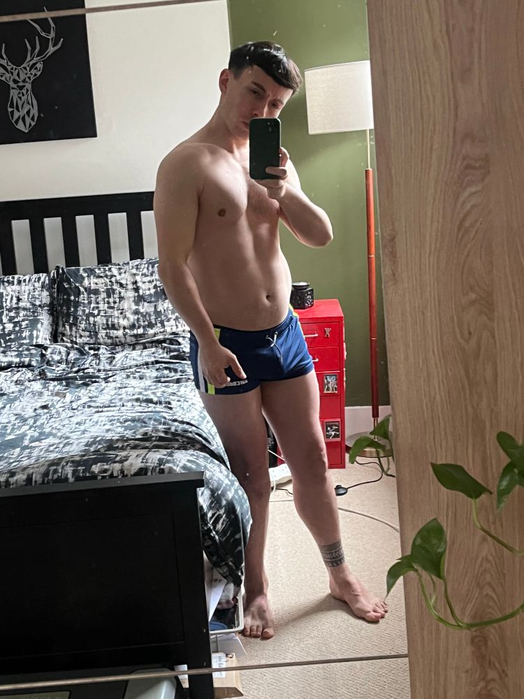 A thotty picture taken in a mirror wearing shorts that are too small