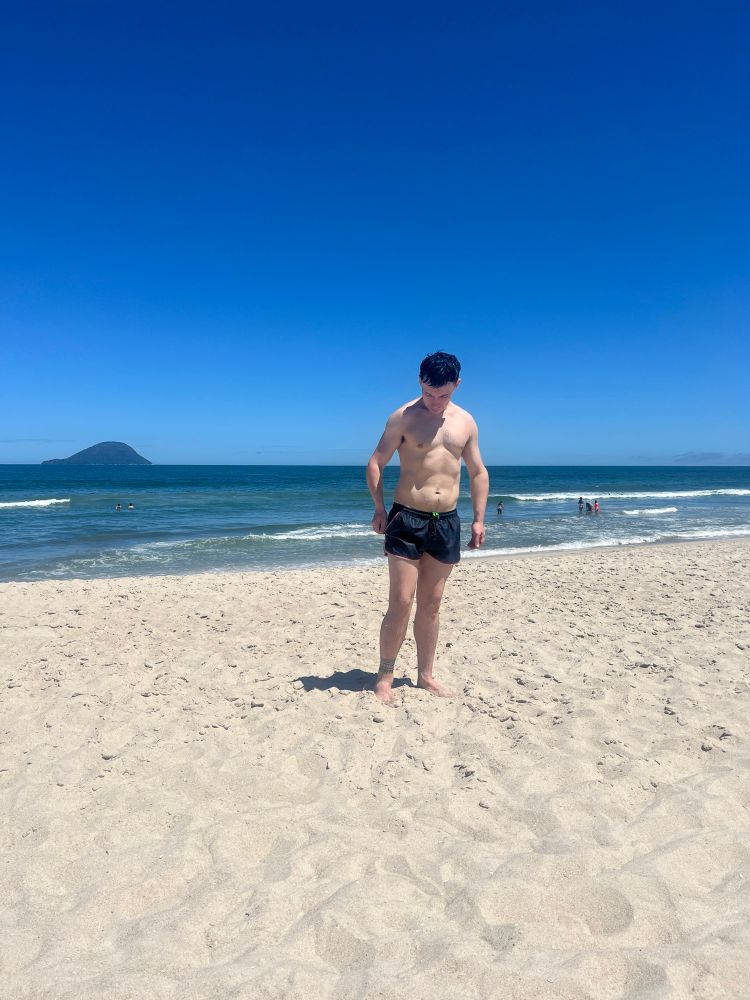 Me on a beach, looking down