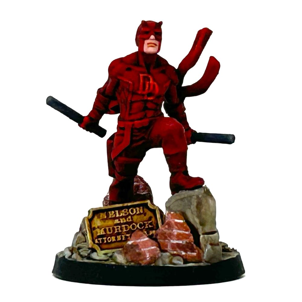 Marvel's Daredevil, standing over the rubble of his former office
