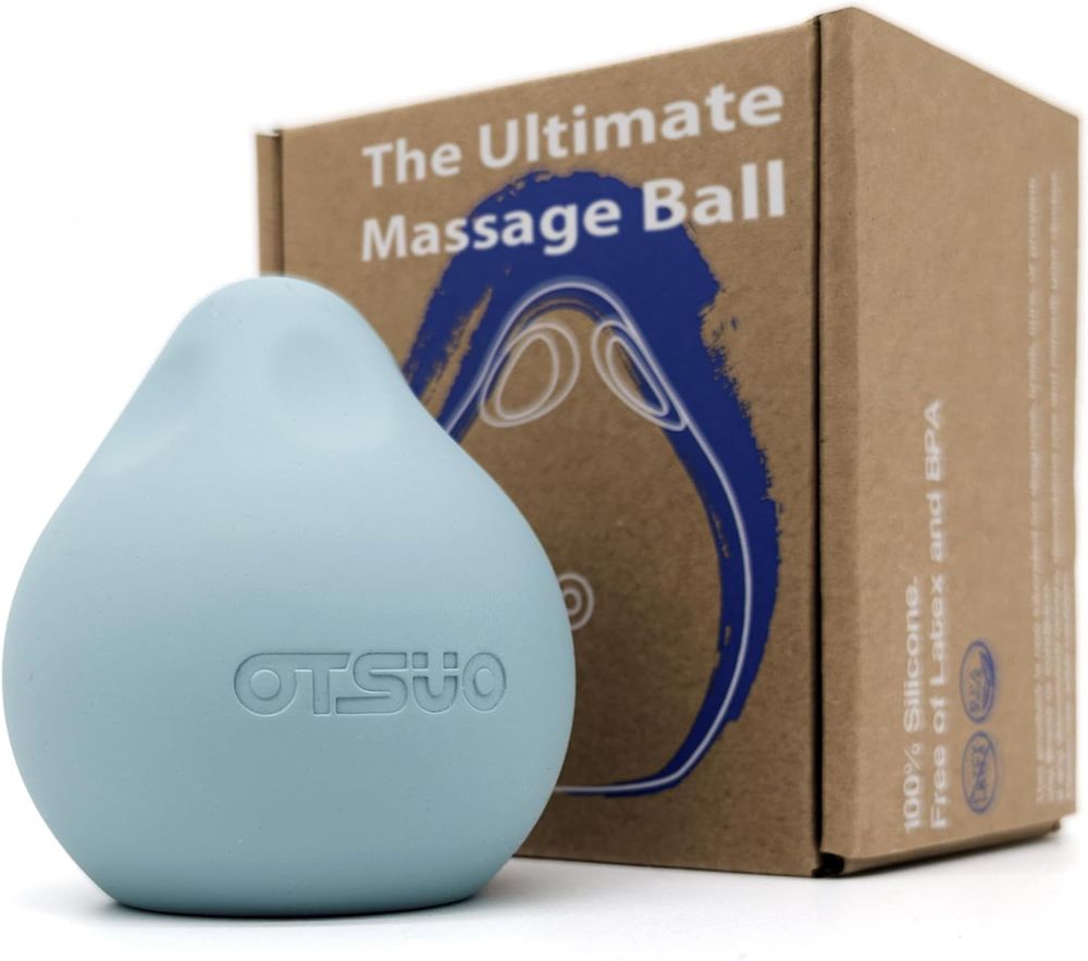 The OTSUO massage ball, a blue ball that is round on the bottom with a pointy end on the top.