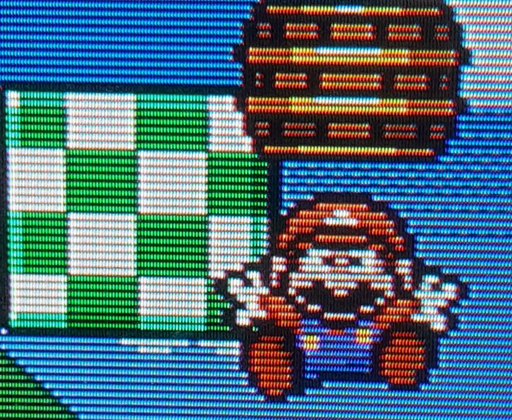 Mario falling out of his bucket