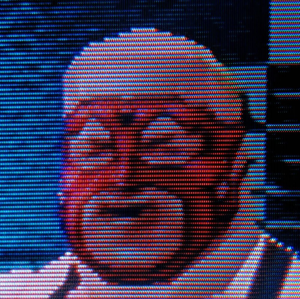 Big Van Vader 64 smiling during a flash