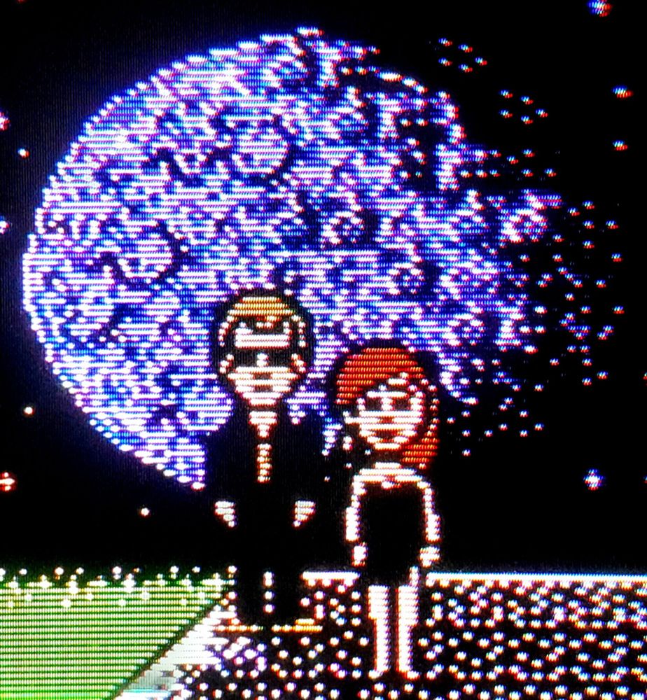 Syd and Razor standing in front of a giant moon