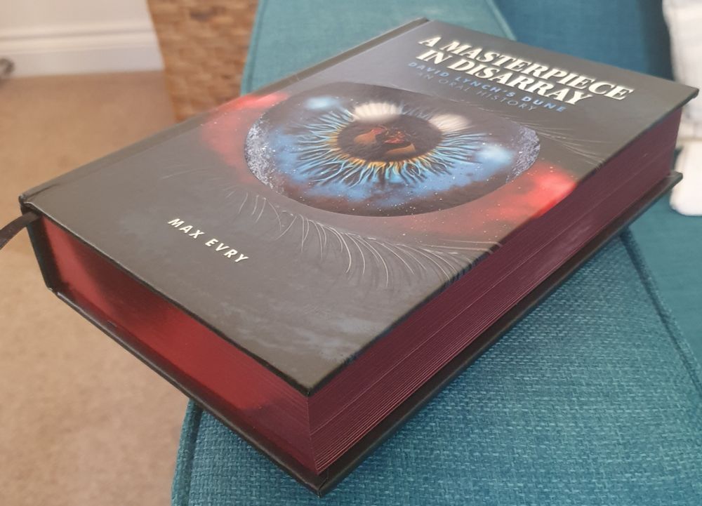 A Masterpiece in Disarray from the side. Those red edged pages look great.