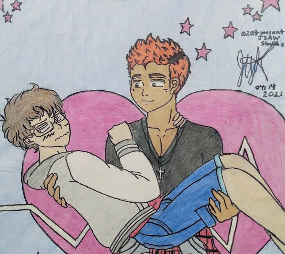 Two guys, one holding the other