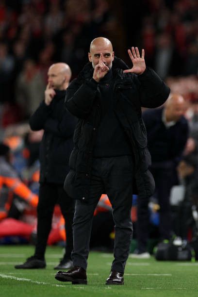 Pep Guardiola holds his fingers up to signal how many games he’s lost. 