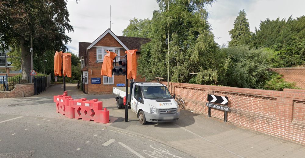 Same location, a van parked on the pavement. 