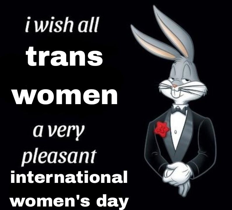 The 'Bugs Bunny in a Tux' meme: Bugs stands in his tux with red boutonnière and a wry expression on his face. He is giving you a half-lidded side-eye. The caption reads: "i wish all TRANS WOMEN a very pleasant international women's day."