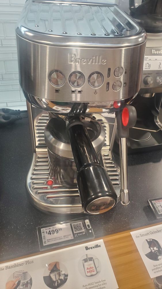 From best-buy. A compact metal espresso machine from Breville. The e-ink tag reads $499.99