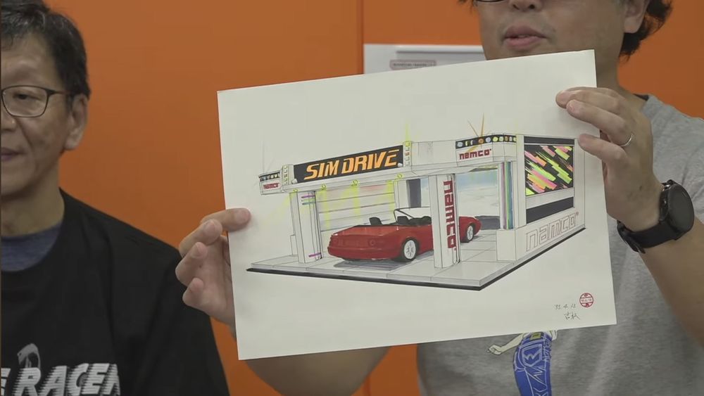 Concept art of the Full Scale cabinet featuring the name "SimDrive", also by Yoshimatsu.
