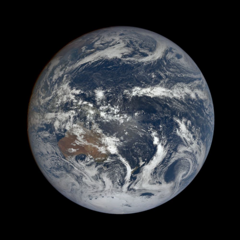 Earth from space, centered on the Coral Sea, captured on Friday, November 14, 2025 at 12:22:24 AM by NASA's DSCOVR EPIC camera.