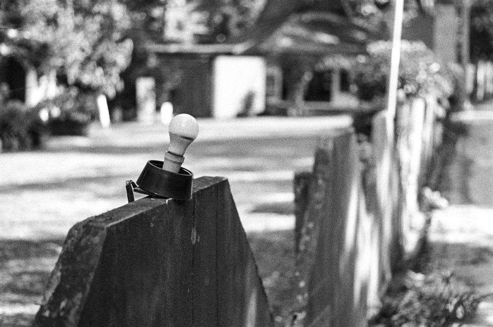 a light bulb on a fence