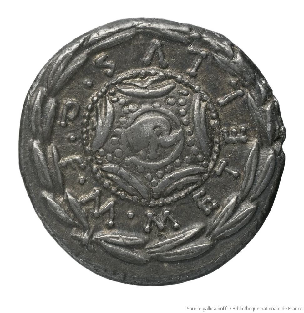 Macedonian shield with elephant's head in the middle, M·METELLVS·Q·F, all in laurel wreath.
https://gallica.bnf.fr/ark:/12148/btv1b10426109v