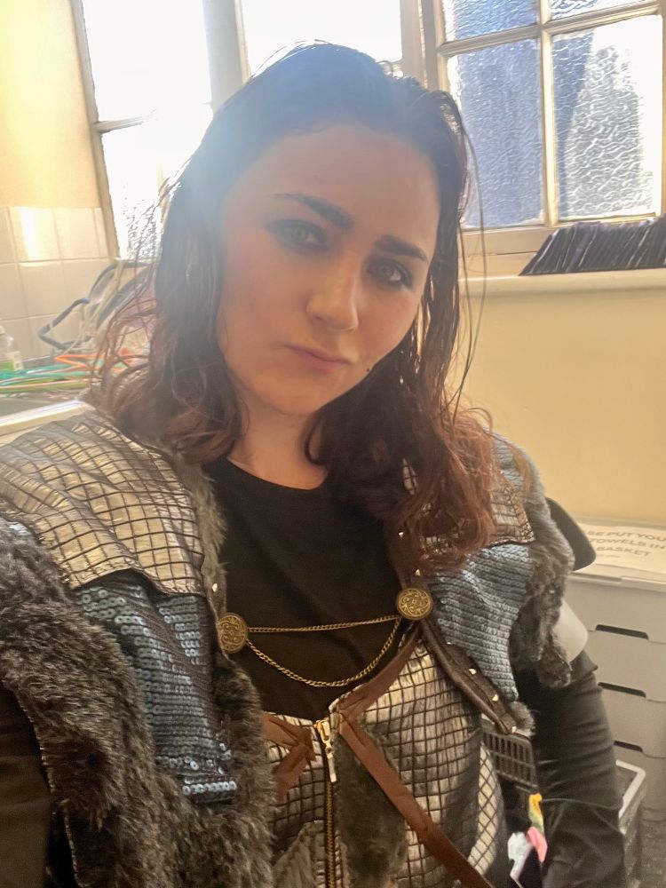 Me in my space hamlet costume in heavy eye make up doing a fuck bot face 