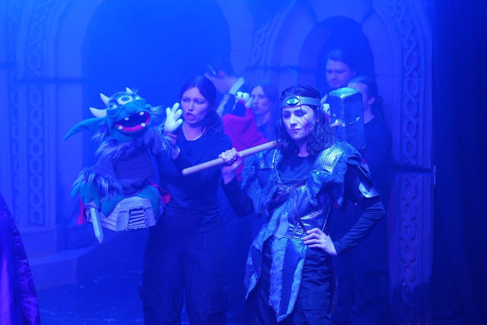Me dressed as a space Viking himbo being lectured by a green yoda looking puppet   
