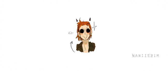 Tv crowley with mid length hair in a headband, skinny jeans and rolled up shirtsleeves getting an Evil Idea