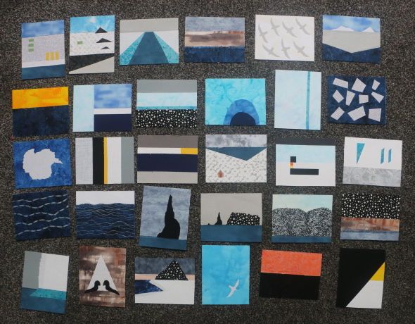 30 postcard sized images created with assorted fabrics and threads. There is a lot of grey, turquoise blue, black, and white as recurring colour themes. Triangles, lines, and curves are recurring shapes.