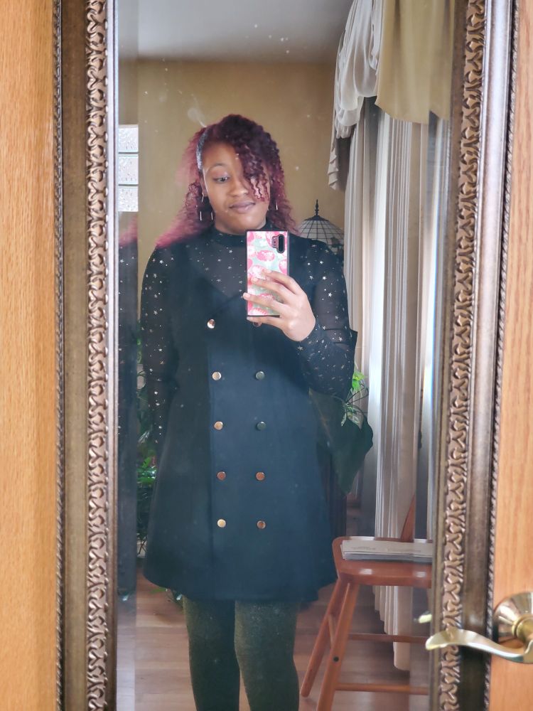 Black pinafore button dress with mesh star top and gold sparkle tights
(Everything from Amazon)