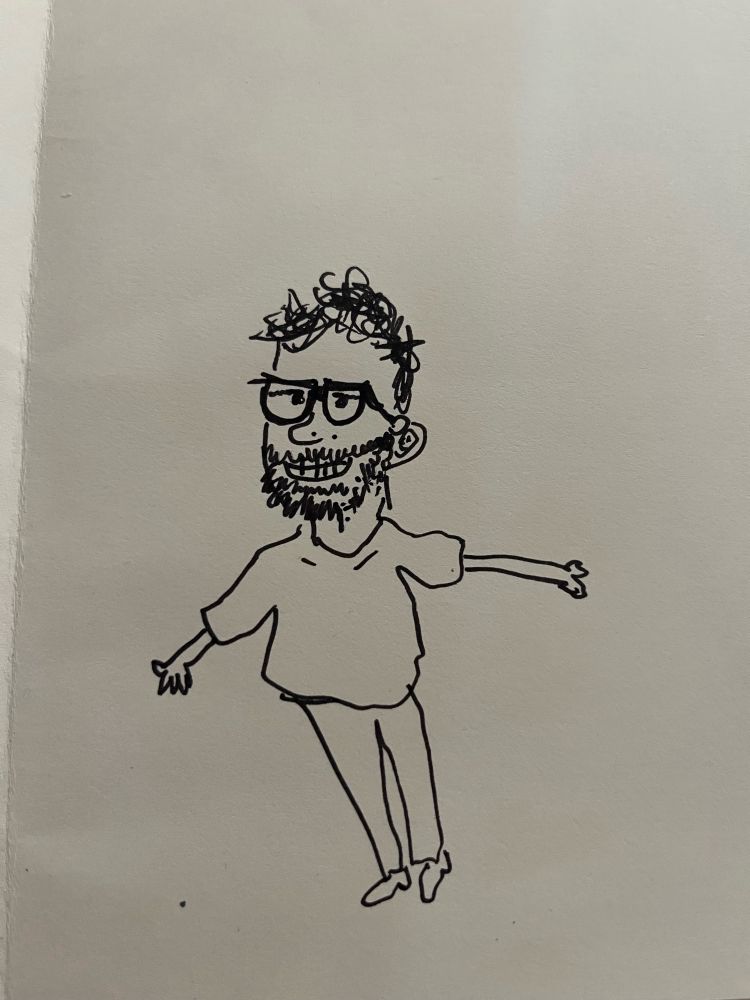 Black ink on white paper cartoony sketch of a bearded me with black framed glasses that leave a good amount of space on either side of my eyes.
