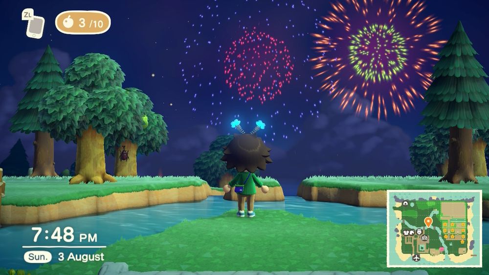 The same Animal Crossing character stands on a grassy patch near a river, surrounded by trees, watching vibrant fireworks in red, blue, and orange with green centers. The sky is dark with stars, and the in-game clock shows 7:48 PM on Sunday, August 3rd, with the island minimap visible in the lower right corner.