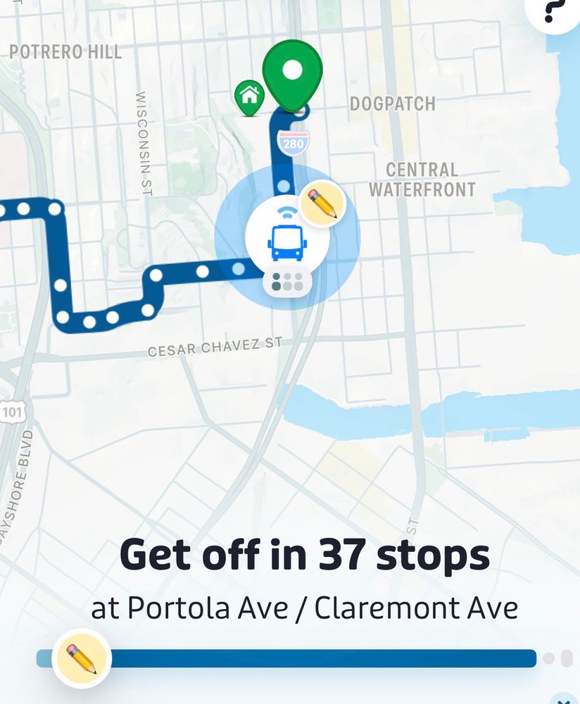 A digital map showing a bus route in San Francisco. The route is marked with a thick blue line and white dots indicating stops, starting near Dogpatch and Central Waterfront, and continuing past Cesar Chavez Street. A green pin marks the starting point near Interstate 280, with a small house icon beside it. A blue circle with a bus icon indicates the current bus location. Text at the bottom reads: “Get off in 37 stops at Portola Ave / Claremont Ave.”