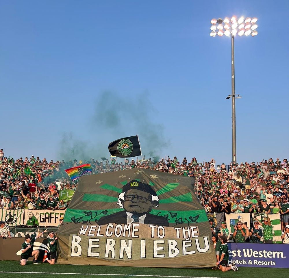 Vermont Green fans at Virtue Field with a Tifo depicting Bernie Sanders with the words "welcome to the Berniebeu", a play on the name of Real Madrid's Santiago Bernabeu Stadium 