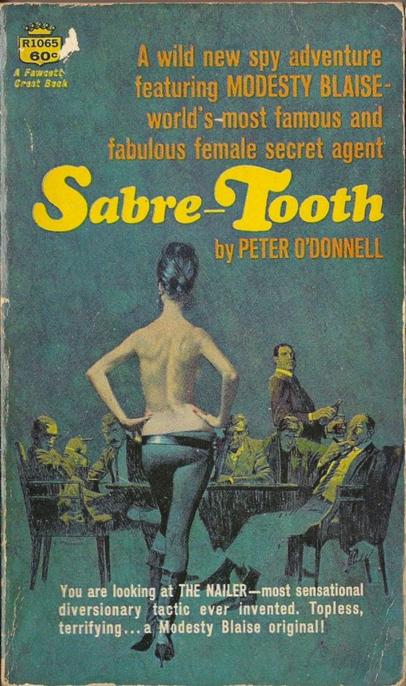 bluish-green book cover that reads, in small orange font, "A wild new spy adventure featuring MODESTY BLAISE - world's most famous and fabulous female secret agent" and then in larger yellow font: "Sabre-Tooth" with "by PETER O'DONNELL" in the small orange font. this is written above a topless Modesty, seen from behind, wearing low-rise black leggings and boots with her hands on her hips. she stands in front of a table surrounded by sinister-looking men in suits with guns, booze, and cigars. at the bottom of the cover, in white font, it reads "You are looking at THE NAILER - most sensational diversionary tactic ever invented. Topless, terrifying... a Modesty Blaise original!" 