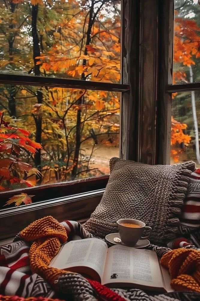 coffee cup and book on a cozy setting