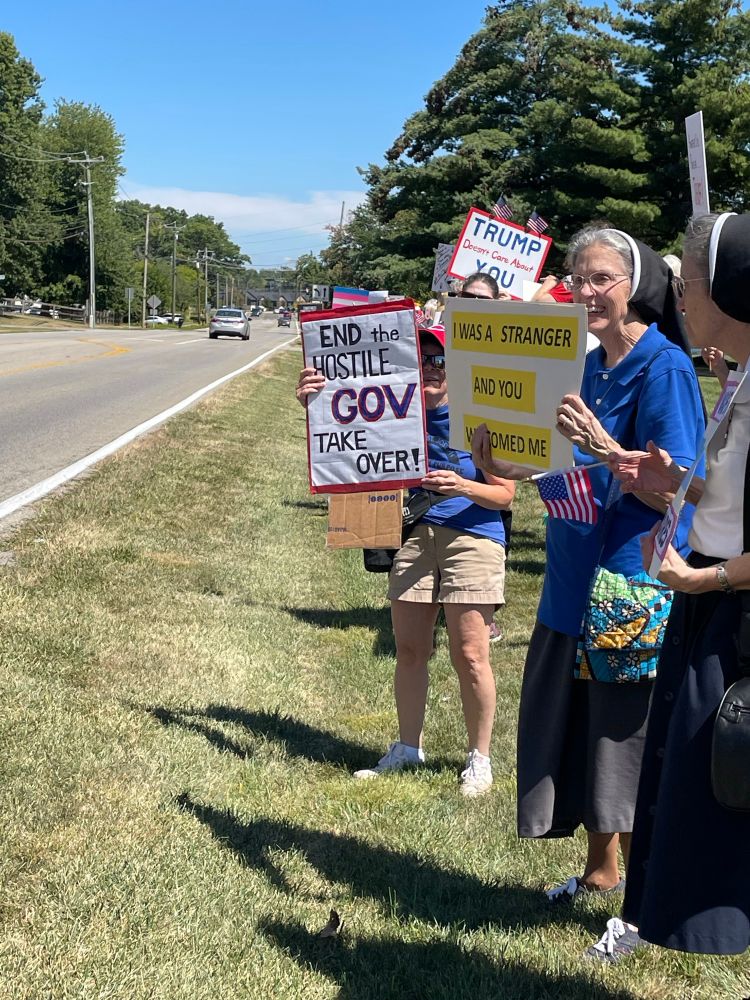 Rally participants including sisters from a religious community 