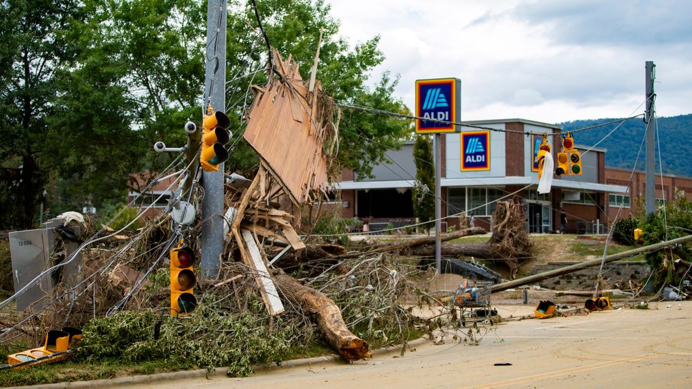 Isolated from the world, Asheville residents scavenge for food amid Helene floods